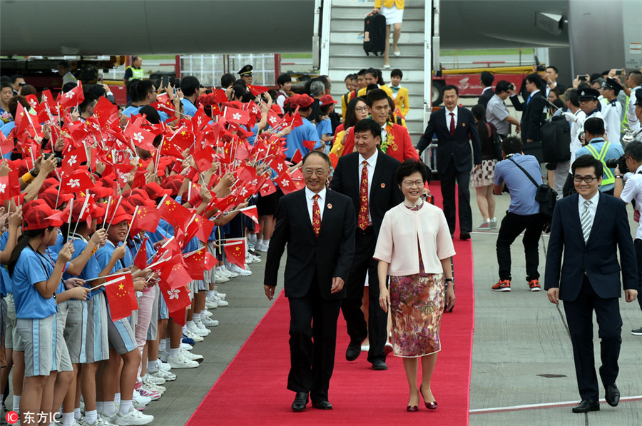 Mainland Olympians receive red carpet welcome in HK