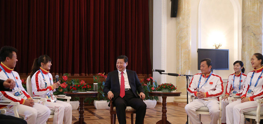 President Xi meets Chinese athletes in Sochi