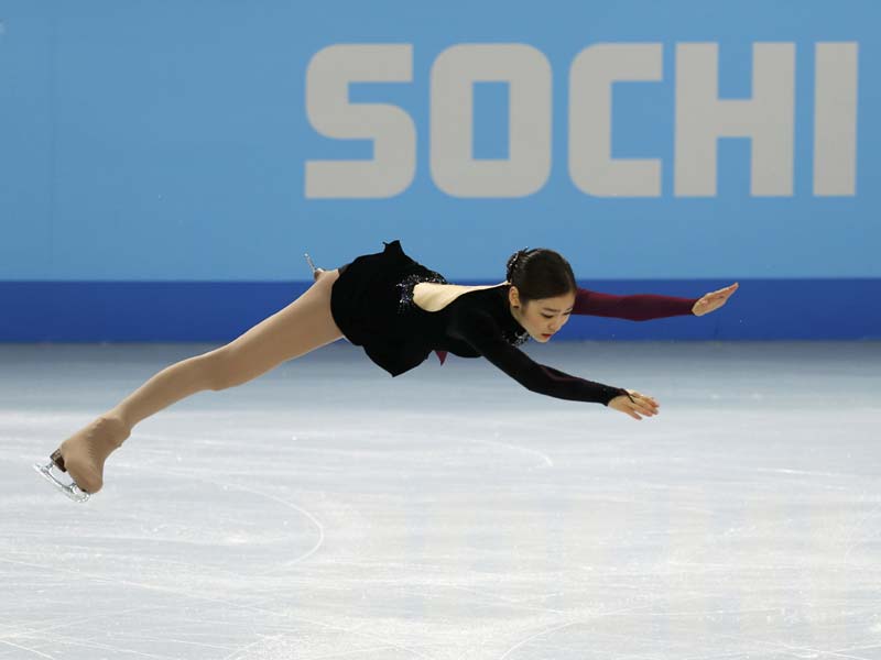 Russian stuns Kim to win dramatic figure skating gold