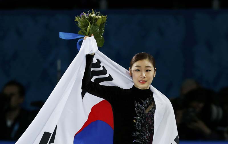 Russian stuns Kim to win dramatic figure skating gold