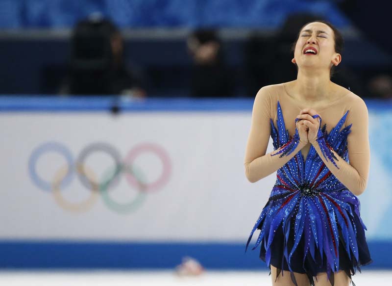 Russian stuns Kim to win dramatic figure skating gold