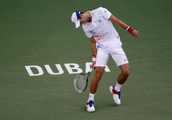 Djokovic subdues aggressive Stakhovsky in Dubai