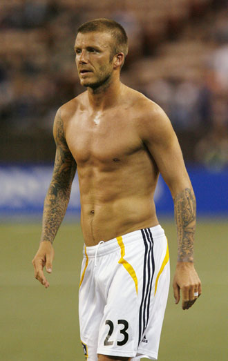 David Beckham of L.A. Galaxy walks off the field after their Pan-Pacific Soccer Championship match against Gamba Osaka at Aloha Stadium in Honolulu, Hawaii February 20, 2008. Galaxy suffered a 1-0 lost. [Agencies]