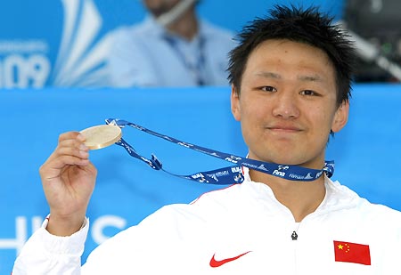 Zhang wins China's first ever men's gold at swimming worlds