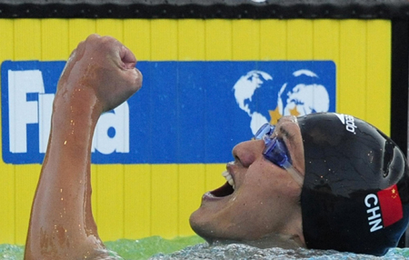 Zhang wins China's first ever men's gold at swimming worlds