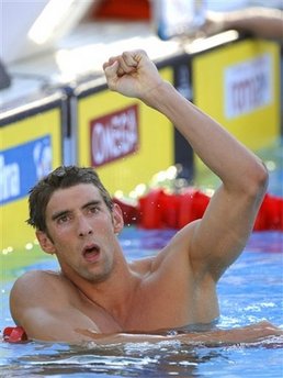 After stunning loss, Phelps rebounds with record