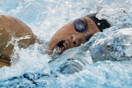 Zhang wins China's first ever men's gold at swimming worlds