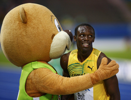 Bolt shatters world record with 9.58