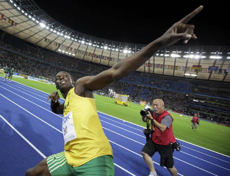 Bolt shatters world record with 9.58