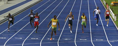Bolt gets gold, another record in 200 at worlds