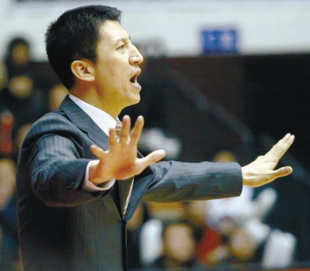 China basketball coach Guo avoids the axe