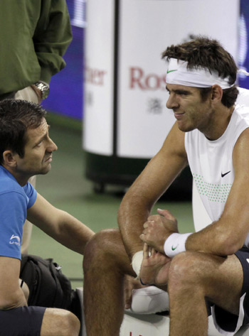 Nadal through in Shanghai, Del Potro retires