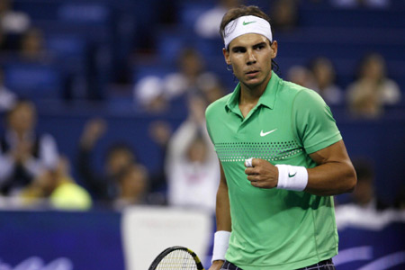 Nadal goes through, more retirements in Shanghai