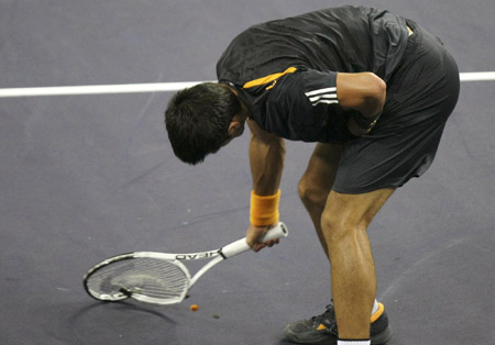 Ljubicic quits to let Nadal through in Shanghai