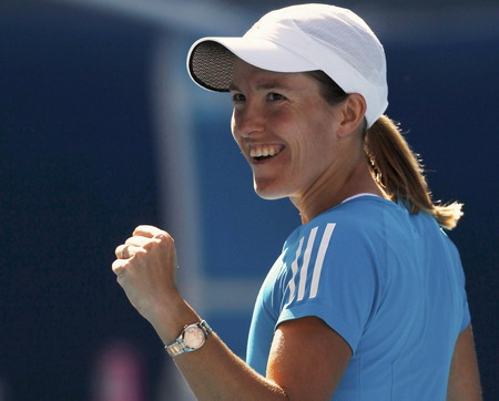 Henin destroys Zheng to make Open final