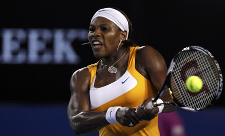 Williams beats Henin to win Australian Open