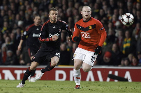 Rooney at the double as United coasts past Milan