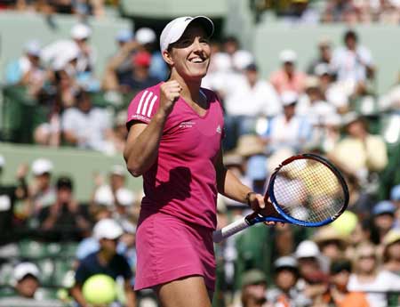 Henin beats Wozniacki through Miami semis