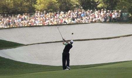 Woods tames course as charm offensive continues