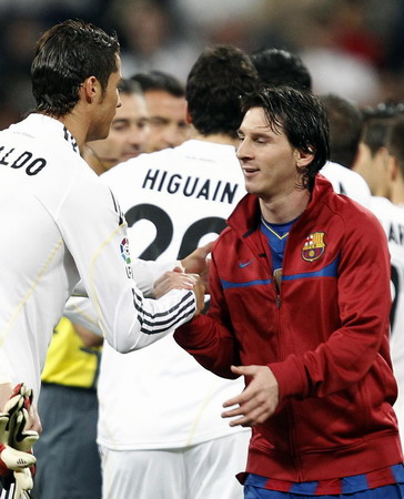Barcelona beats Madrid 2-0 to lead Spanish league