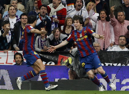Barcelona beats Madrid 2-0 to lead Spanish league