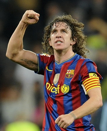 Barcelona beats Madrid 2-0 to lead Spanish league