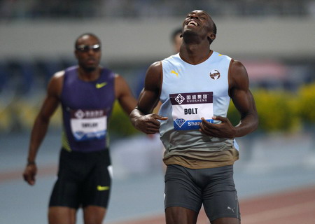 Bolt wins men's 200m race with a bang in Shanghai