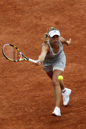 Victorious Schiavone achieves first for Italy