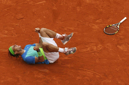 Emotional Nadal back where he belongs