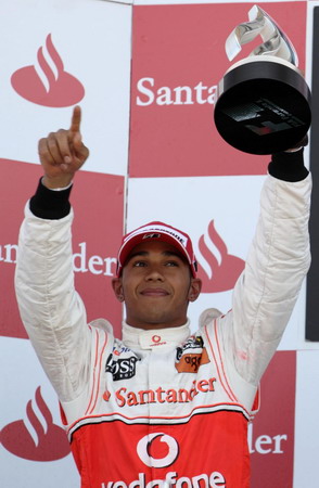 Webber wins British GP after incident with Vettel
