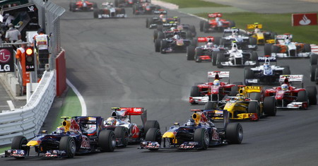 Webber wins British GP after incident with Vettel