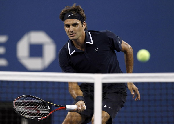Federer grabs first-round US Open win with a flourish