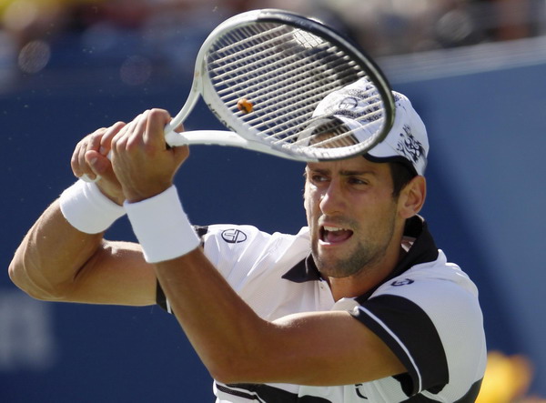 Djokovic nets easy win over American Fish