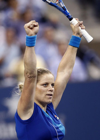 Clijsters beats Stosur to set up semi-final with Venus