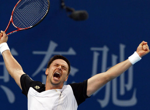 Murray, Soderling through to last eight in Beijing