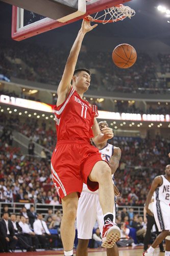 Yao plays 19 mins as Rockets beat Nets in NBA China Games