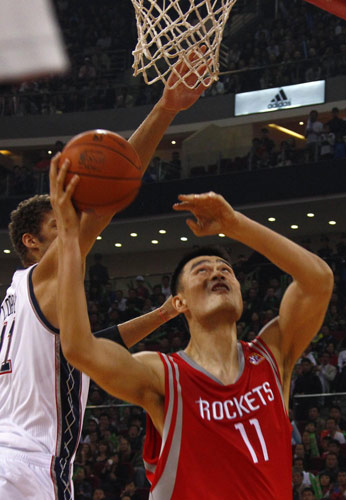 Yao plays 19 mins as Rockets beat Nets in NBA China Games
