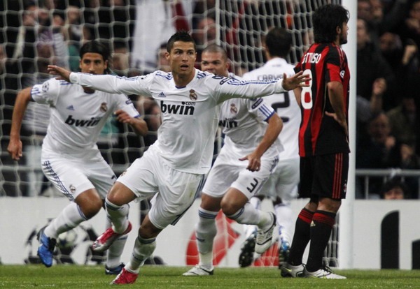 Madrid seize control of Group G by beating Milan
