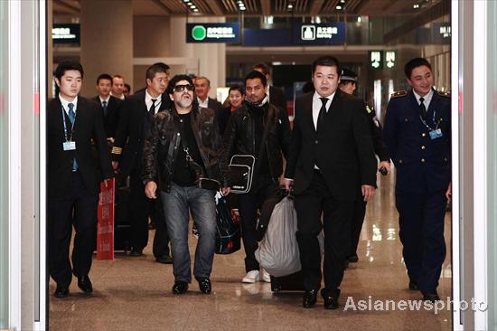 Maradona arrives at Beijing for charity tour