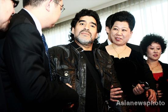 Maradona arrives at Beijing for charity tour