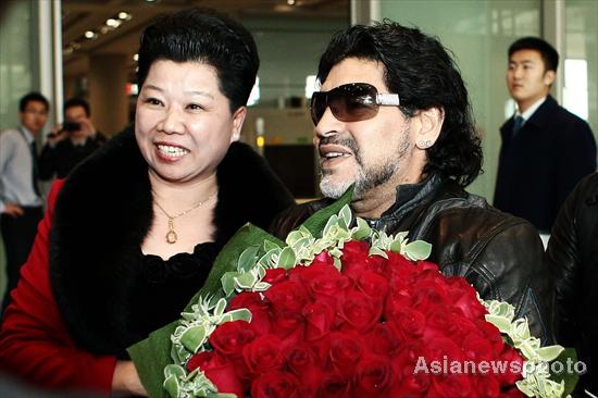 Maradona arrives at Beijing for charity tour