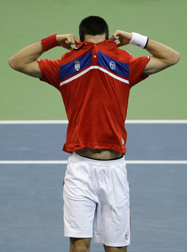 Serbian champions shave heads to celebrate Davis Cup victory