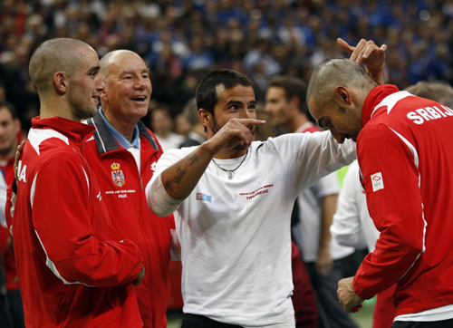 Serbian champions shave heads to celebrate Davis Cup victory