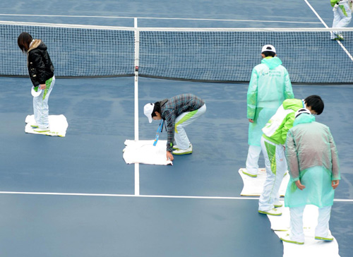 Volunteers brave the rain for Games