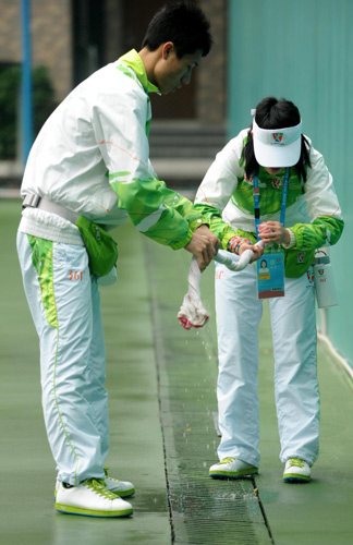 Volunteers brave the rain for Games