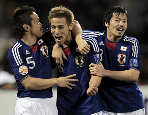 Japan ride out penalty controversy to beat Syria