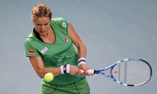 Clijsters survives to progress in Paris