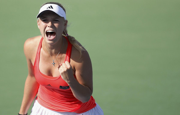 Wozniacki topples Clijsters from the top
