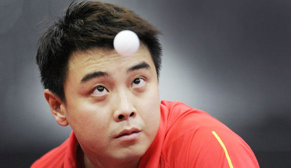 Wang Hao wins tough game to reach quarters