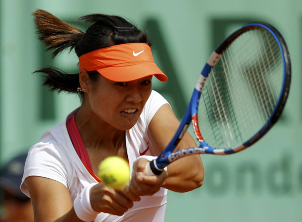China's Li Na reaches 2nd round at French Open